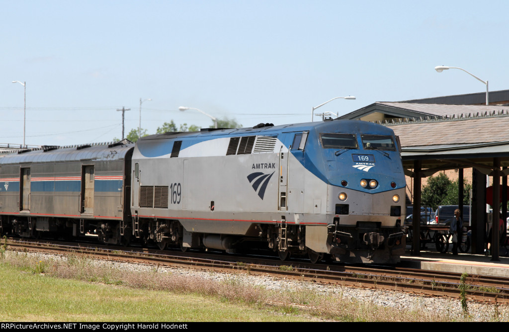 AMTK 169 leads train P080 into the station